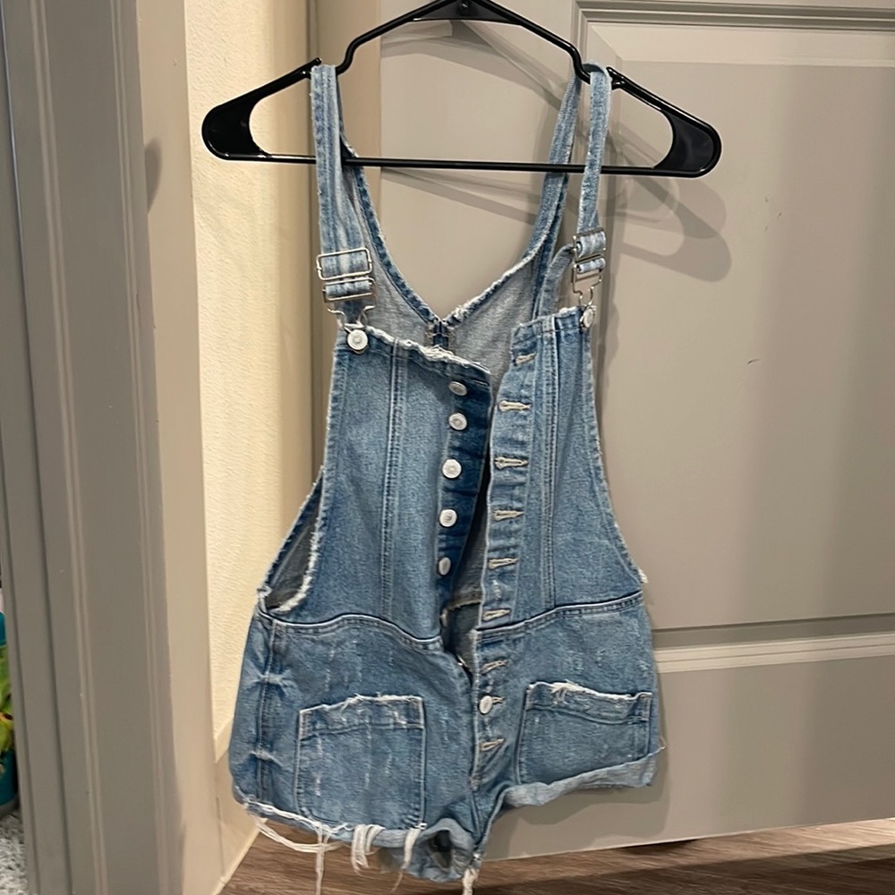 Size xs light wash, frayed overalls